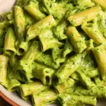 vegan creamy spinach garlic pasta with cashews and parsley
